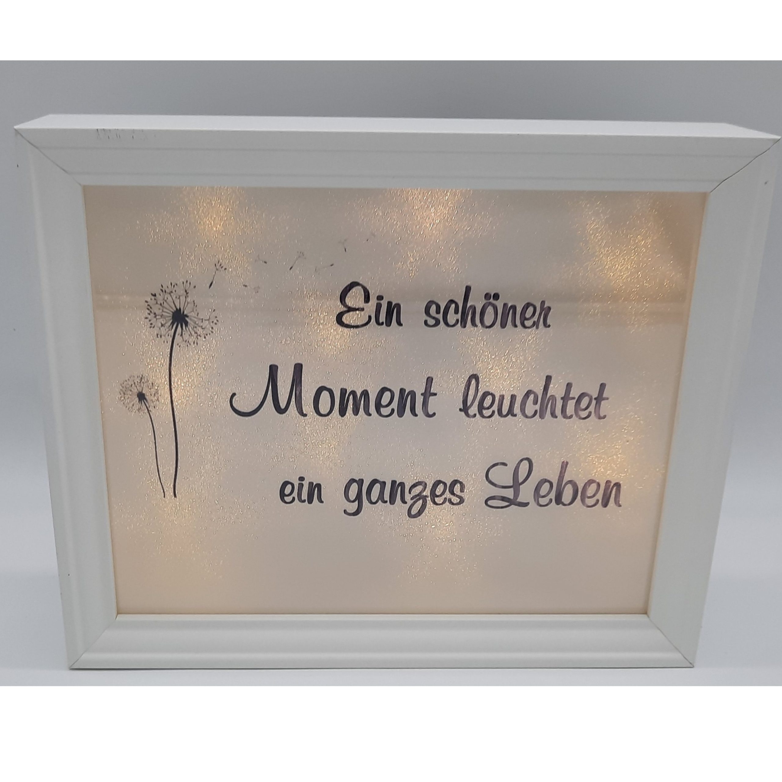 Leuchtrahmen mit Text: Ein schöner Moment leuchtet ein ganzes Leben